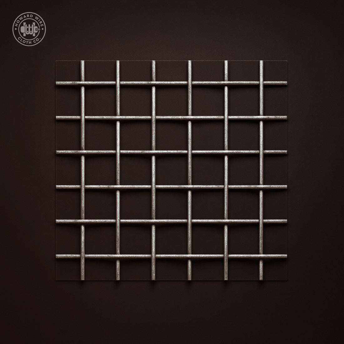Studio product photograph of galvanized woven wire mesh, 1 inch mesh with .135 inch wire diameter, on a dark graphite background.