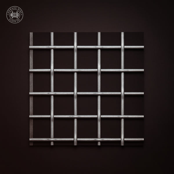Studio product photograph of galvanized woven wire mesh, 1-1/2 inch mesh with .120 inch wire diameter, on a dark graphite background.