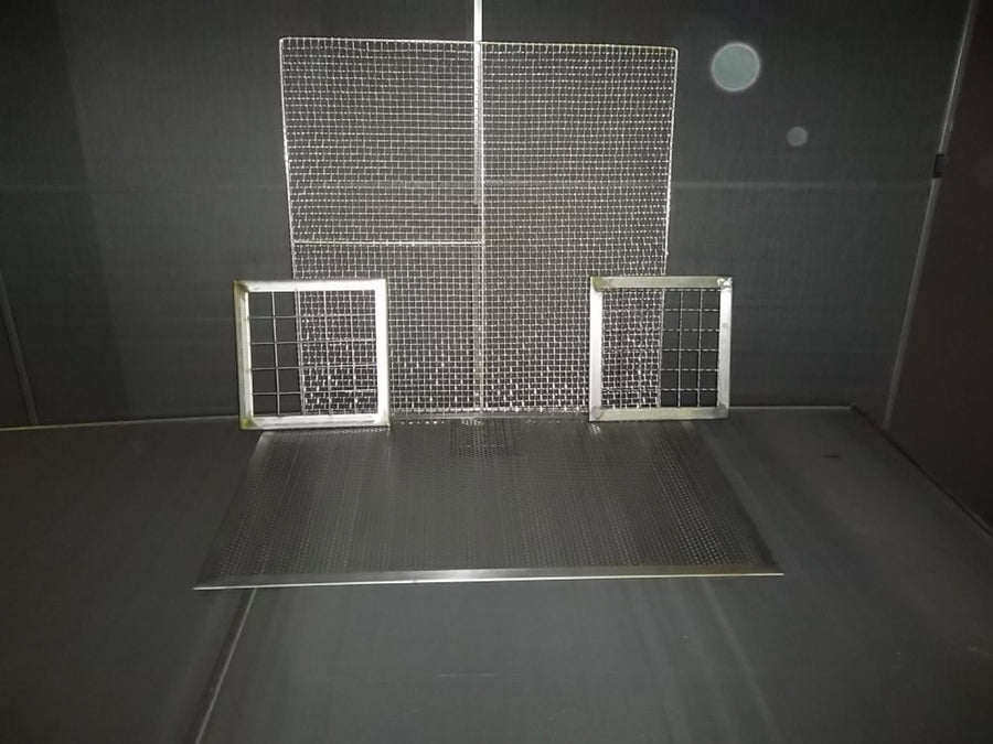 Framed and U-edged wire mesh panels beside a raw cut panel and a perforated sheet