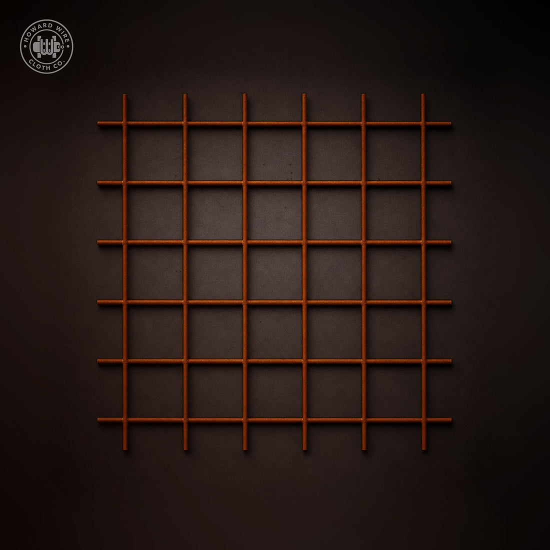 Close-up of Corten A242 weathering steel welded wire mesh with 3" x 3" openings in .188" wire