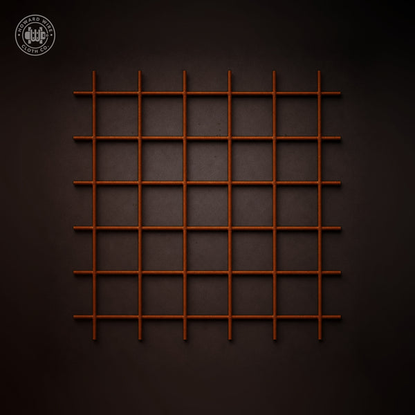 Close-up of Corten A242 weathering steel welded wire mesh with 3" x 3" openings in .188" wire